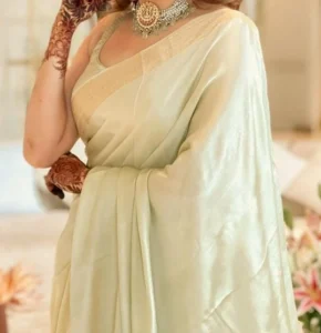 A Classic Off White Saree with Golden Border