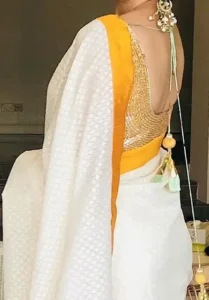 Golden Blouse With White Saree 