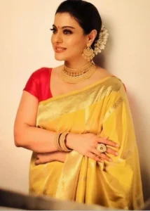 Kajol in Yellow Silk Saree with Contrast Red Blouse 