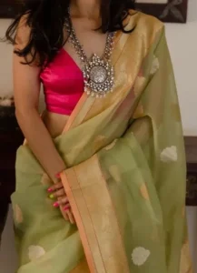 Pink Blouse With Green Saree 