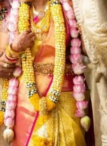 Yellow Nandhiyavattam Malai Design For Wedding 